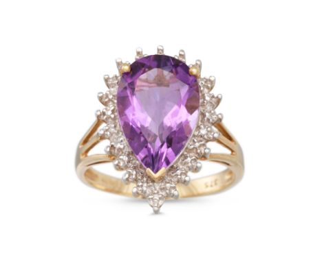 AN AMETHYST AND DIAMOND CLUSTER RING, the large pear shaped amethyst to diamond surround, mounted in 9ct yellow gold, size M