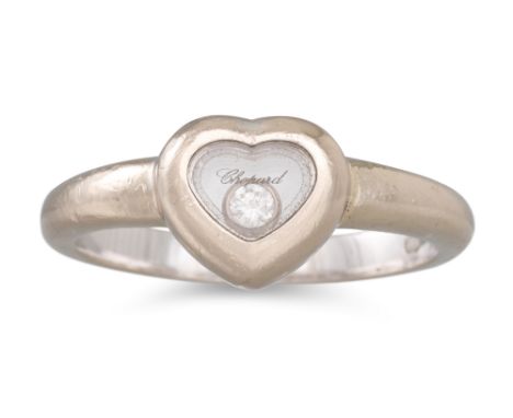 A CHOPARD HEART SHAPED HAPPY DIAMOND RING, mounted in 18ct white gold, signed Chopard, in Chopard box. Size: J