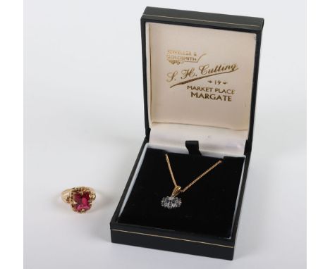 A diamond and sapphire cluster pendant on 9ct chain, pendant 13mm across, with a 9ct ring with red stone, stone 11mmx9mm, (2)