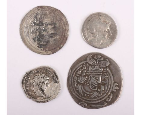 A group of ancient coins, including two Sassanian, a Caracalla Denarius, another Rome Denarius, (4)