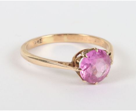 A 9ct pink sapphire solitaire ring, 8mm stone, reputedly from the Burmese mines