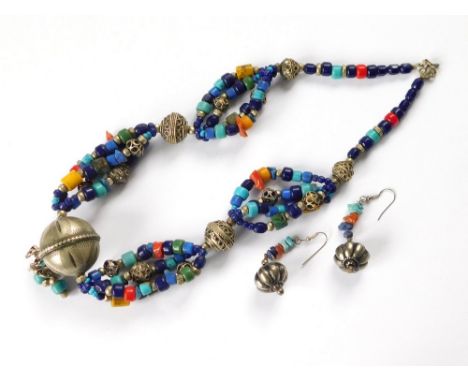 TIBETAN NECKLACE. A Tibetan white metal & bead necklace including turquoise, coral & some glass beads. Also, a pair of simila