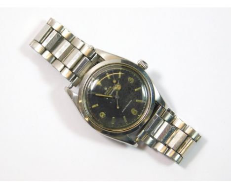 ROLEX. A gentleman's scarce stainless steel cased Rolex Oyster Perpetual Explorer, model 5504 wristwatch, c.1957/8. The black