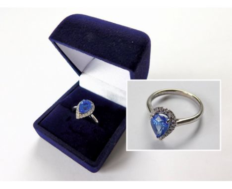 RIVER MOUNTS RING. An 18ct. white gold River Mounts sapphire & diamond ring, the sapphire of approx. 2.2ct. within a border o