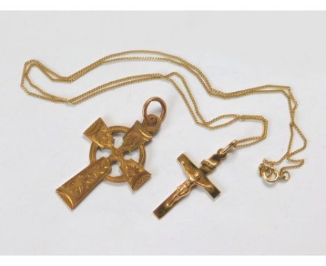 GOLD CROSS ETC. A 9ct. gold engraved Celtic cross & a 9ct. gold crucifix on fine 9ct. gold chain. Gross weight approx. 5.6g. 