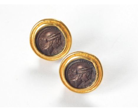 EARRINGS. A pair of 'Ancient Coin' style ear clips, set in gilt metal.  Please note that all items in this auction are previo