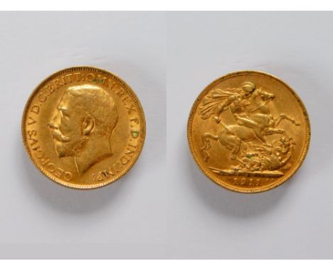 GOLD COIN. A George V 1911 full sovereign.  Please note that all items in this auction are previously owned & are offered on 