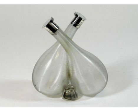 OIL & VINEGAR BOTTLES. An Edwardian silver mounted, ribbed glass oil & vinegar bottle by Hukin & Heath. London 1898.  Please 