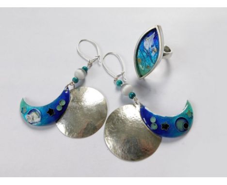 JAMES & SAMANTHA SUDDABY. A 'Surfing Under the Moon & Stars', ring & earrings set. Each piece made in 999 fine silver by Jame
