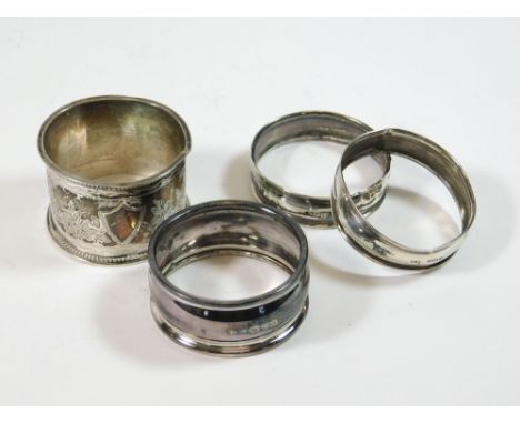 NAPKIN RINGS. A Victorian engraved napkin ring, a pair of plain napkin rings, Birmingham 1923 & one other napkin ring initial