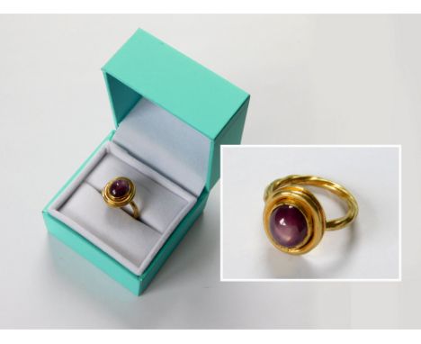 JAMES SUDDABY. A contemporary, James Suddaby hand made 999 (24ct.) fine gold dress ring, set a star ruby of approx. 6.1ct. Bi