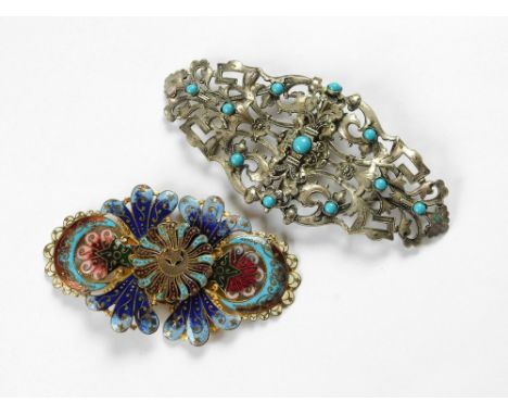 BUCKLES. A white metal, two part buckle with turquoise coloured glass beads & a gilt metal & enamelled two-part buckle. (Some
