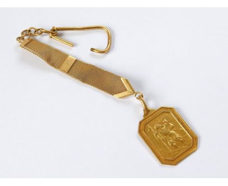 ST. CHRISTOPHER FOB. An Italian 18ct. gold St. Christopher fob, the reverse named & dated for August 1965. Hung on an 18ct. g