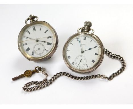 POCKET WATCHES. A 1952 silver open face, keyless pocket watch by Buren, hung on a silver curb link chain. Also, an earlier co