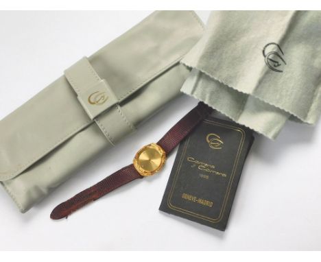 CARRERA y CARRERA. A lady's 18ct. gold cased Carrera y Carrera wristwatch, the design entitled Creation & featuring around th