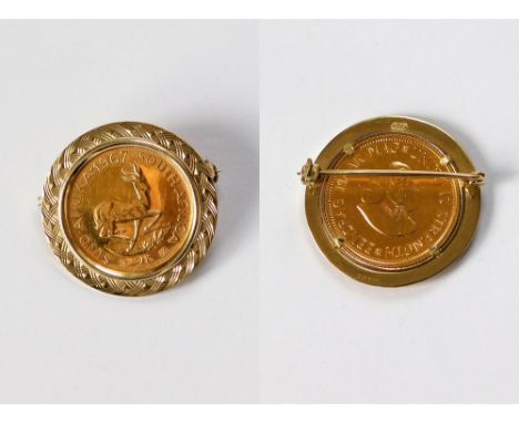 GOLD COIN BROOCH. A 1967 South Africa 2 Rand coin brooch in 9ct. gold mount. Gross weight approx. 12g.  Please note that all 