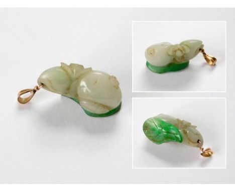 JADE PENDANT. A small green & white jade carved fruit, now mounted as a pendant.  Please note that all items in this auction 