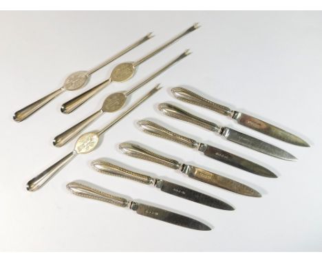 DESSERT KNIVES ETC. A set of six dessert knives with silver plated filled handles & four lobster picks.  Please note that all