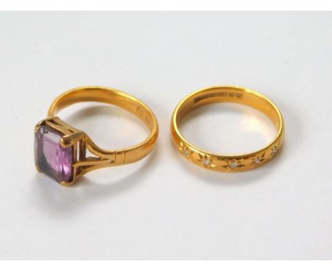 GOLD RING. A 22ct. gold, half hoop diamond set ring. Size L/M. Also, a 22ct. gold dress ring, set a rectangular cut amethyst 