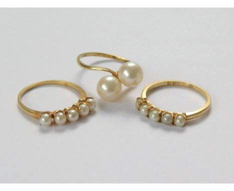 MIKIMOTO. A 14k. Mikimoto cross-over cultured pearl ring, each pearl of approx. 7mm. Also, two Mikimoto 14k. dress rings, eac