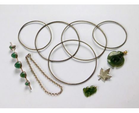 SILVER & GREENSTONE. A sterling silver maple leaf brooch & a silver chain bracelet. Also, five various bangles, a greenstone 