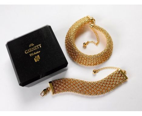 COSTUME JEWELLERY. A flexible gold mesh necklace with matching bracelet from the Garnet Collection. Original box.  Please not