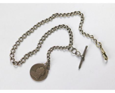 WATCH CHAIN. A silver curb link watch chain with silver T-bar & Victorian medallion attached. (Clip not silver). Approx. 36.2