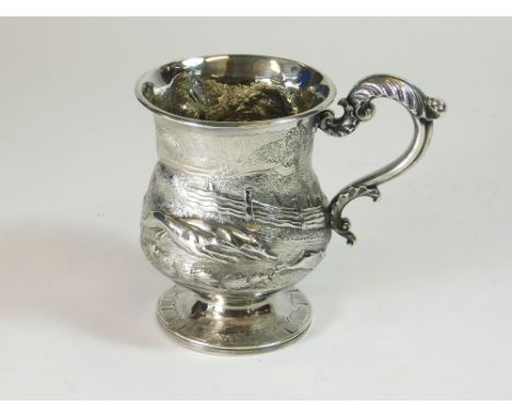 CHRISTENING MUG. A William IV pedestal christening mug decorated with a scene of hare coursing. The vacant cartouche monogram