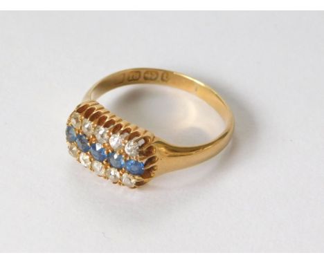 GOLD RING. A late Victorian 18ct. gold sapphire & diamond, 3-row ring. Birmingham 1893. Size P.  Please note that all items i