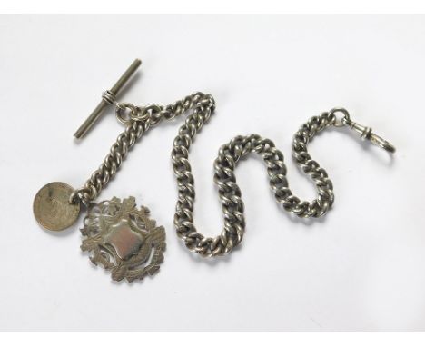 WATCH CHAIN. A substantial silver curb link watch chain with T-bar, silver & silver gilt Edwardian fob & 1926 sixpence attach