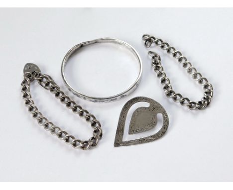 SILVER BRACELETS ETC. A silver curb link bracelet with padlock clasp & one other curb link bracelet, minus clasp. Also, a sil