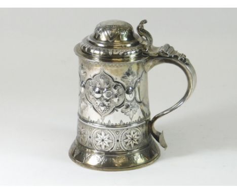 SILVER TANKARD. An early George III silver tankard by William & James Priest, London 1768. Later decorated with typical Victo