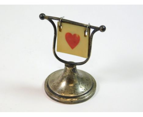 SILVER TRUMPS MARKER. A silver & celluloid trumps marker stand. London 1933.  Please note that all items in this auction are 