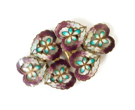 BUCKLE. A gilt metal, two-part enamelled buckle. Width 8cm.  Please note that all items in this auction are previously owned 