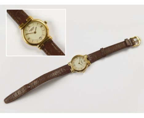 RAYMOND WEIL. A lady's 18ct. gold-plated Raymond Weil wristwatch, the dial with Roman & baton numerals & date aperture. Origi