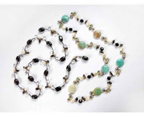 BEAD NECKLACES. A long string of grey & white freshwater pearls, amazonite, smoky quartz & black onyx. Also, a Jaeger lariat 