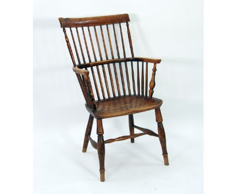 NINETEENTH CENTURY ASH AND ELM COMB BACK WINDSOR OPEN ARMCHAIR, of typical form with solid seat and turned legs tied by a 'H'