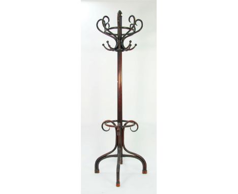 EARLY TWENTIETH CENTURY DARK STAINED BENTWOOD FLOOR STANDING HAT AND COAT STAND, with 8 'S' shaped hooks above a central clus