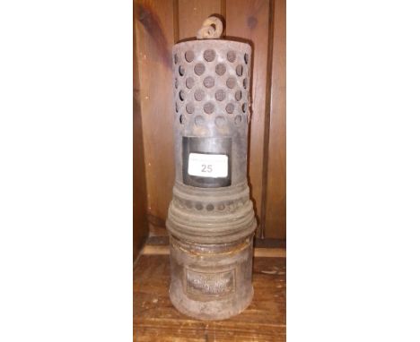 A circa 1920s "The Wolf Radiator Lamp" miner's lamp.
