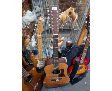 A Tanglewood 12 string acoustic guitar. 