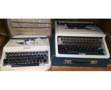 A Mercedes and an Olivetti "Dora" typewriters. 