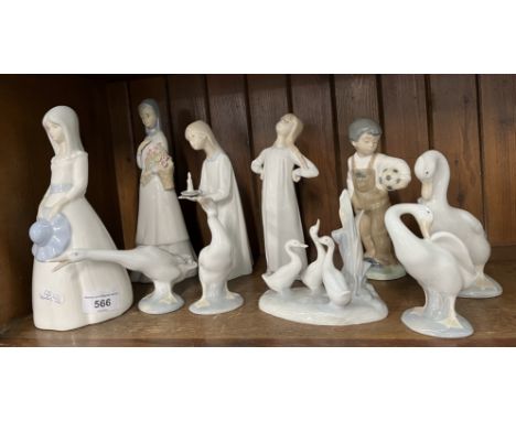 4 Lladro and 4 Nao figurines together with 2 others also made in Spain.&nbsp;Condition - boy holding candle with slight chips