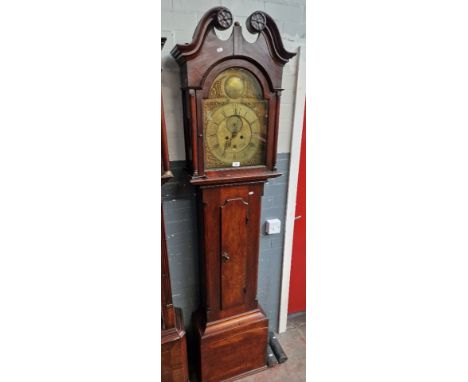 A George III mahogany longcase clock with brass dial marked John Allan Irvine, weights and pendulum. 