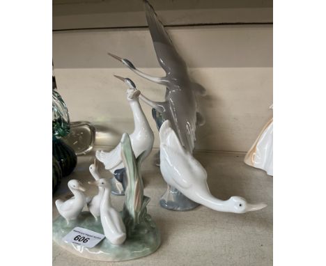Figurines by Nao - ‘Flying Herons’ 28cm high and three others of geese 