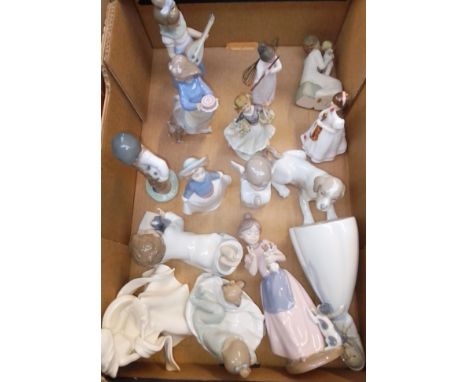 A box of assorted figures, mainly Nao, other Spanish figures including Lladro and other ornaments. Condition - one figure wit