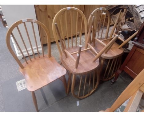 Five vintage Ercol light elm dining chairs. 