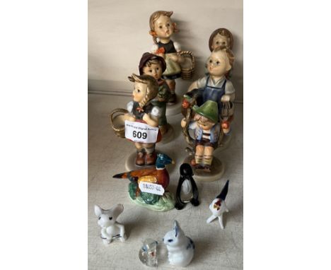 Six Hummel figures and other small ornaments.&nbsp;Condition - all figures with some damage or repair.