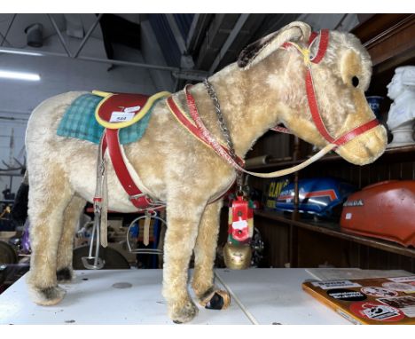 A large Steiff donkey.