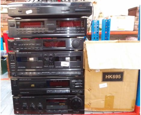 A Technics stackable system; record deck, graphic equalizer, stereo tuner, CD player, integrated amplifier, double cassette d