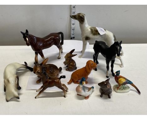 A selection of assorted ceramic figurines including Beswick a/f 